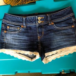 American eagle jean shorts with lace trim